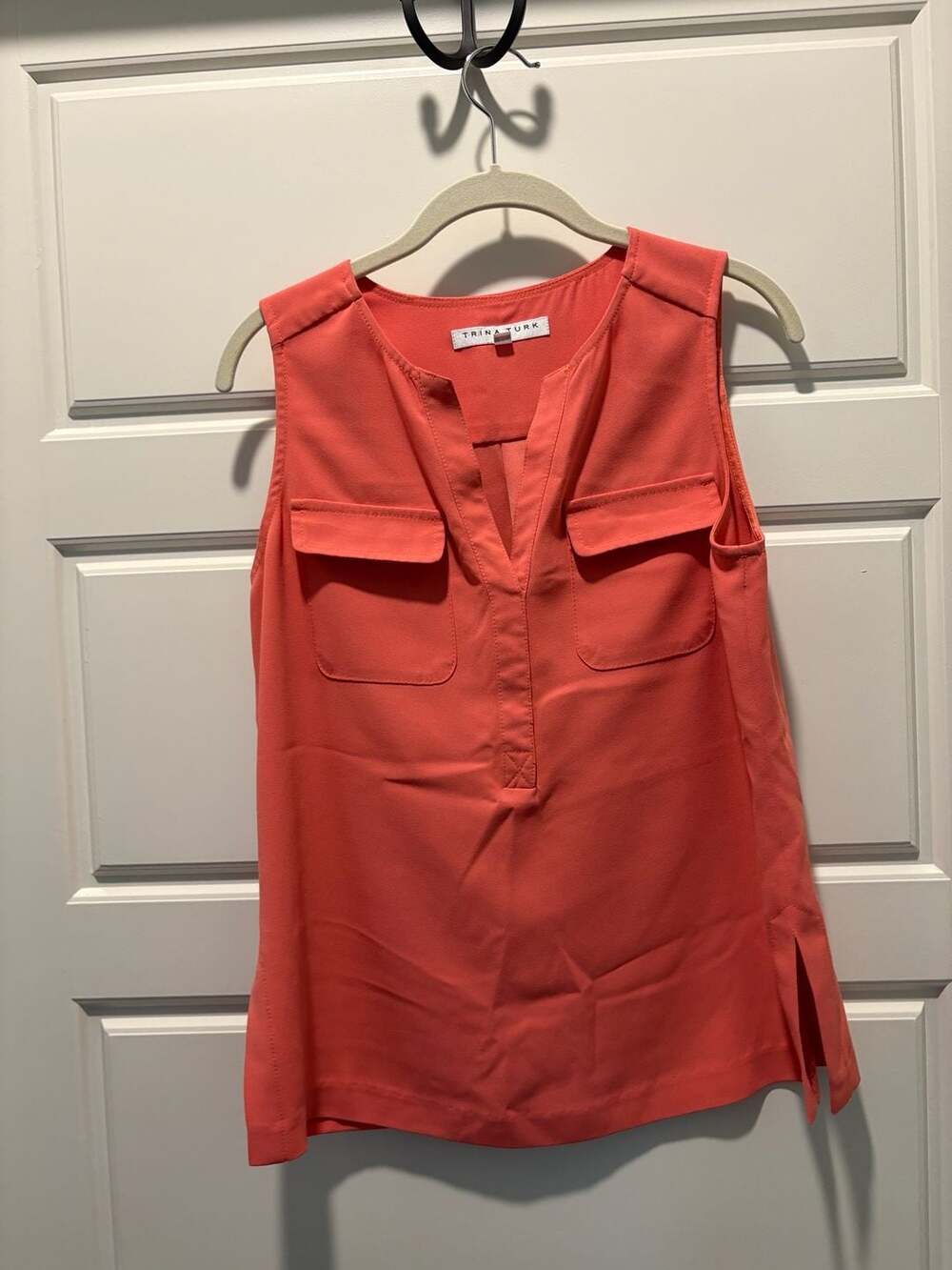 Trina Turk Sleeveless V-Neck Blouse with Front Pockets